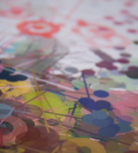 closeup of colorful, printed graphic shapes with bokeh