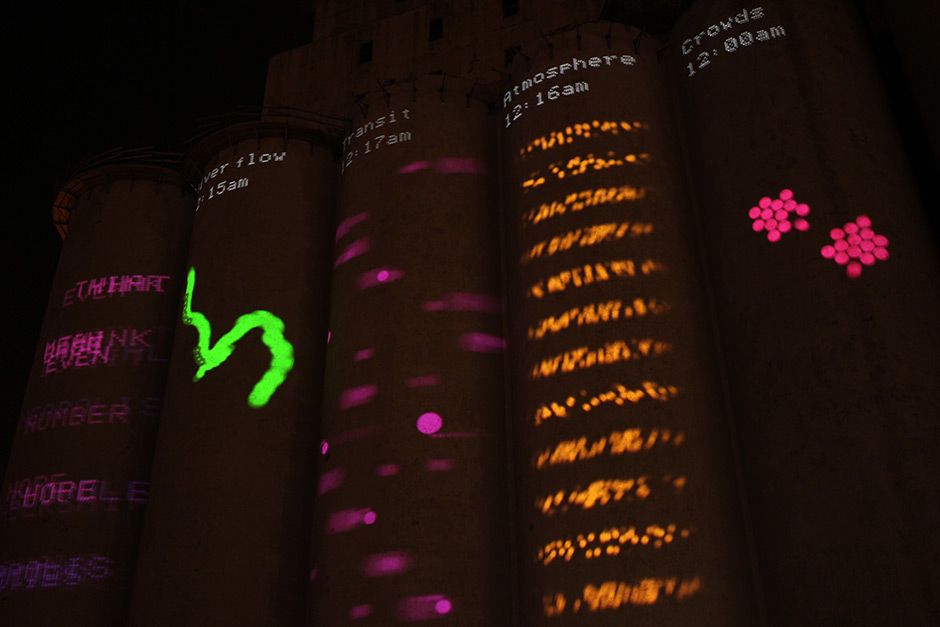 visualizations projected on silos